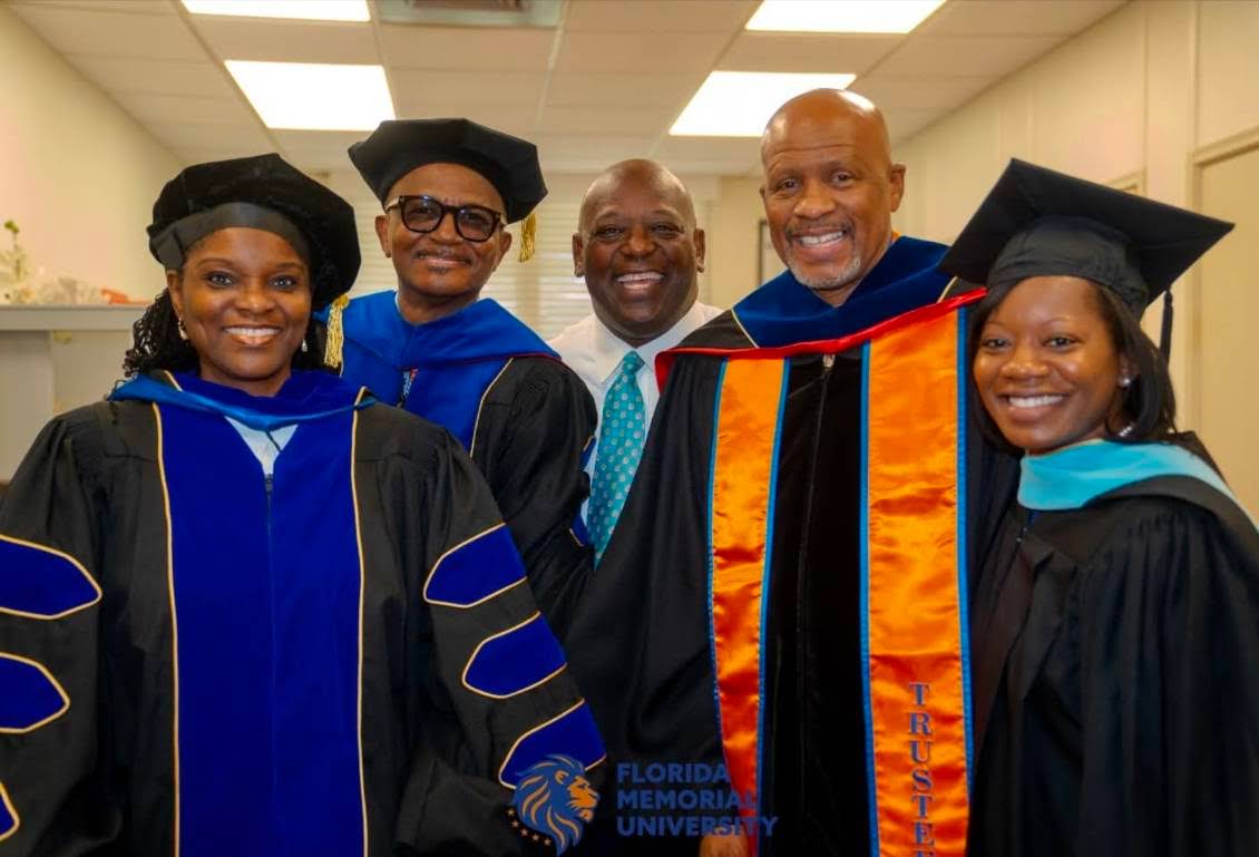 Dr. Bernard W. H. Jennings in academic regalia with fellow university leaders at Florida Memorial University